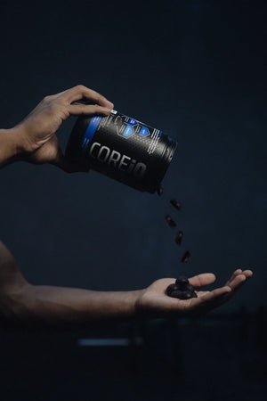 CoreIQ magnesium gummies poured into a hand